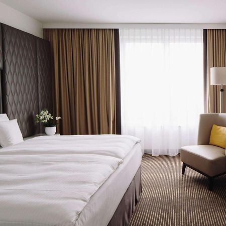 Hotel Pullman Berlin Schweizerhof Exterior foto A room at the Hotel de France