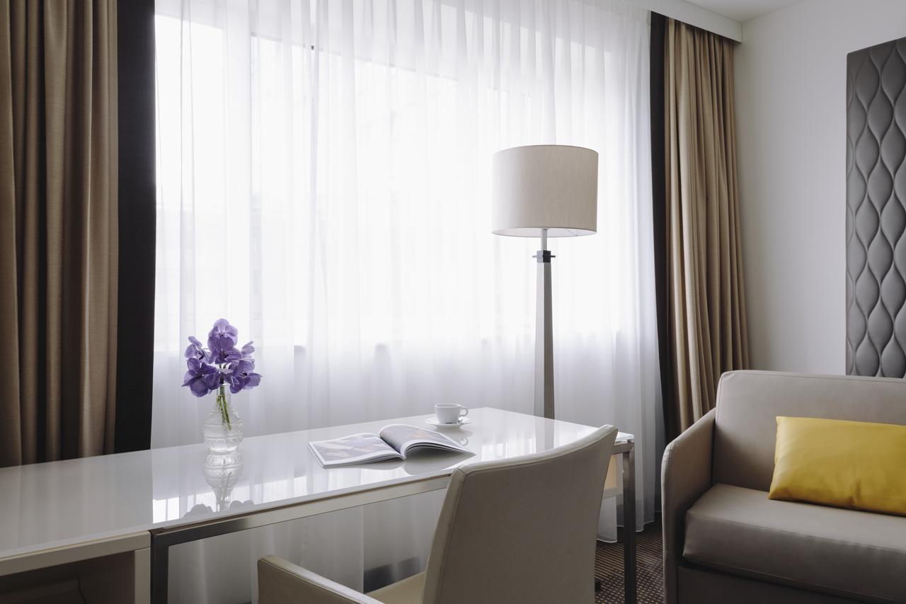 Hotel Pullman Berlin Schweizerhof Exterior foto A room at the hotel