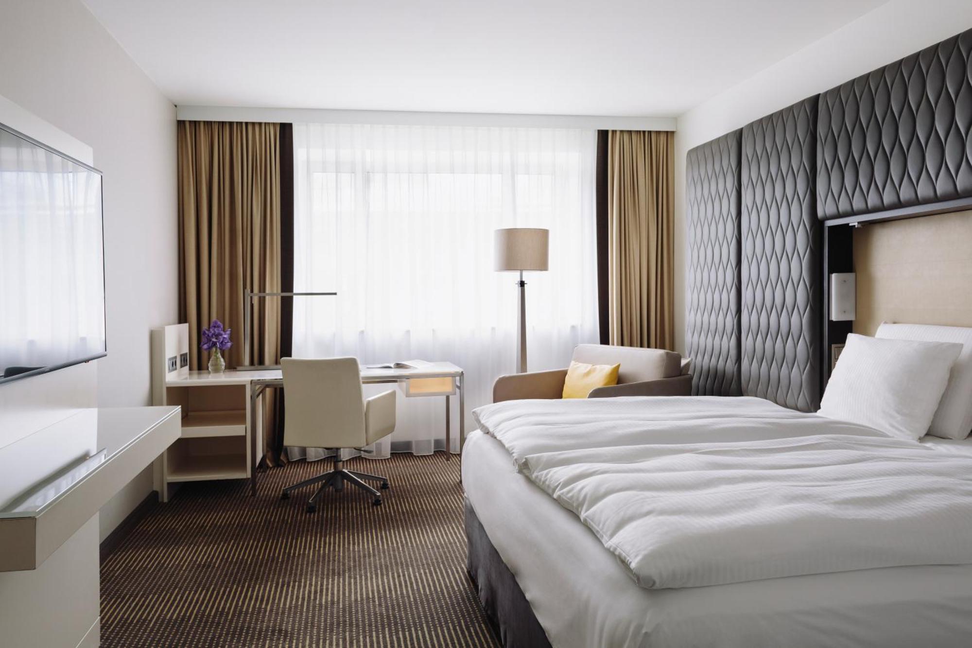Hotel Pullman Berlin Schweizerhof Habitación foto A room at the InterContinental Wien