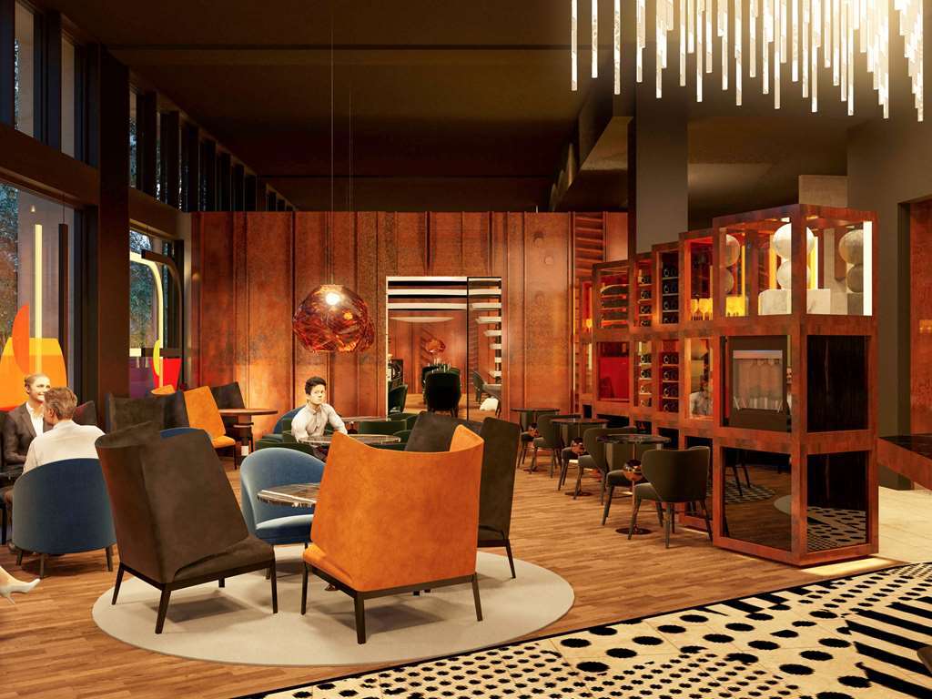 Hotel Pullman Berlin Schweizerhof Restaurante foto The interior of the hotel