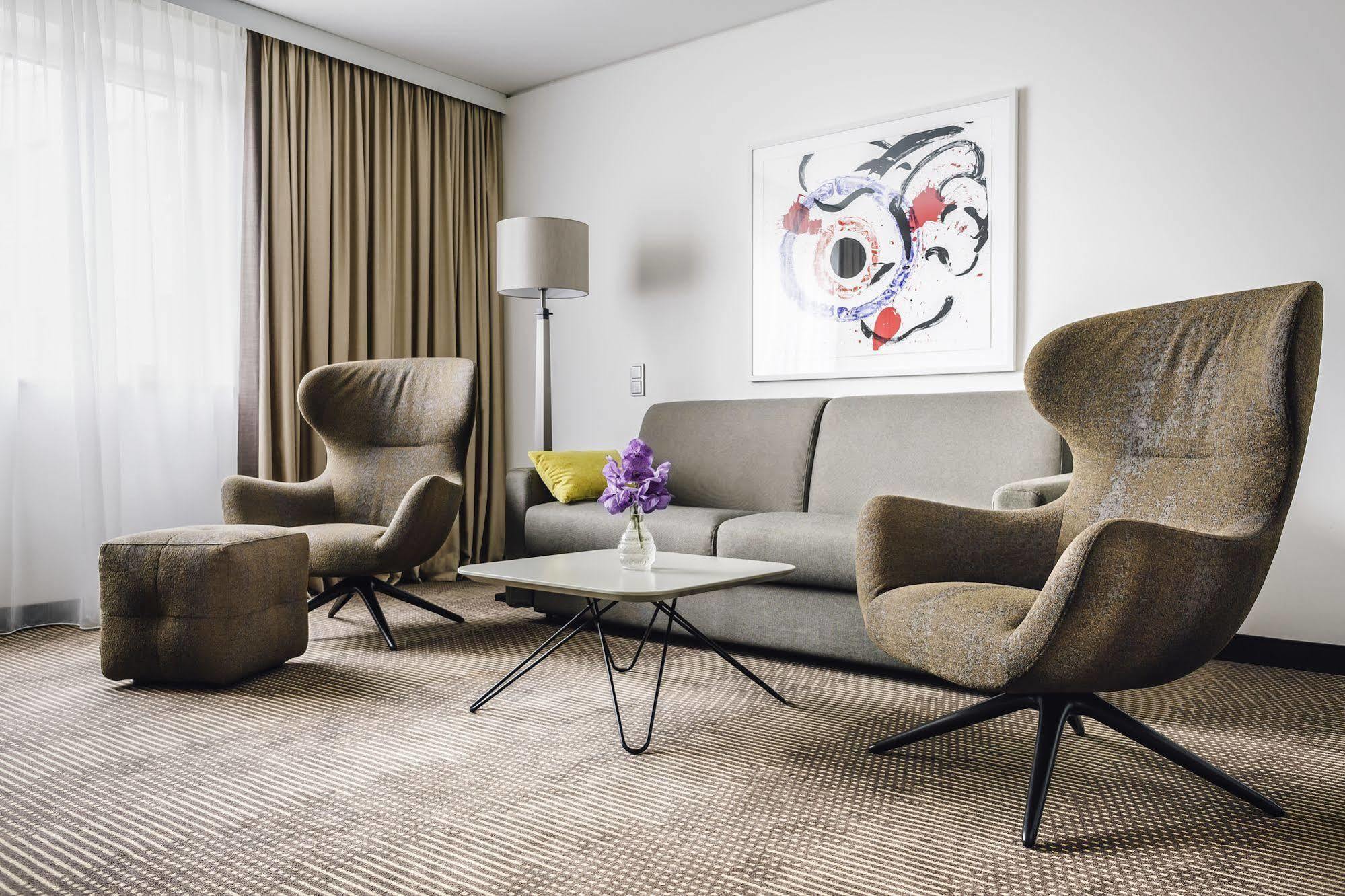 Hotel Pullman Berlin Schweizerhof Exterior foto Interior of a suite at the Hotel de la Paix